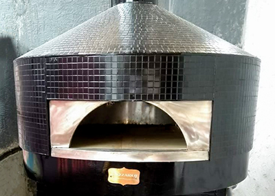 Black metal pizza oven